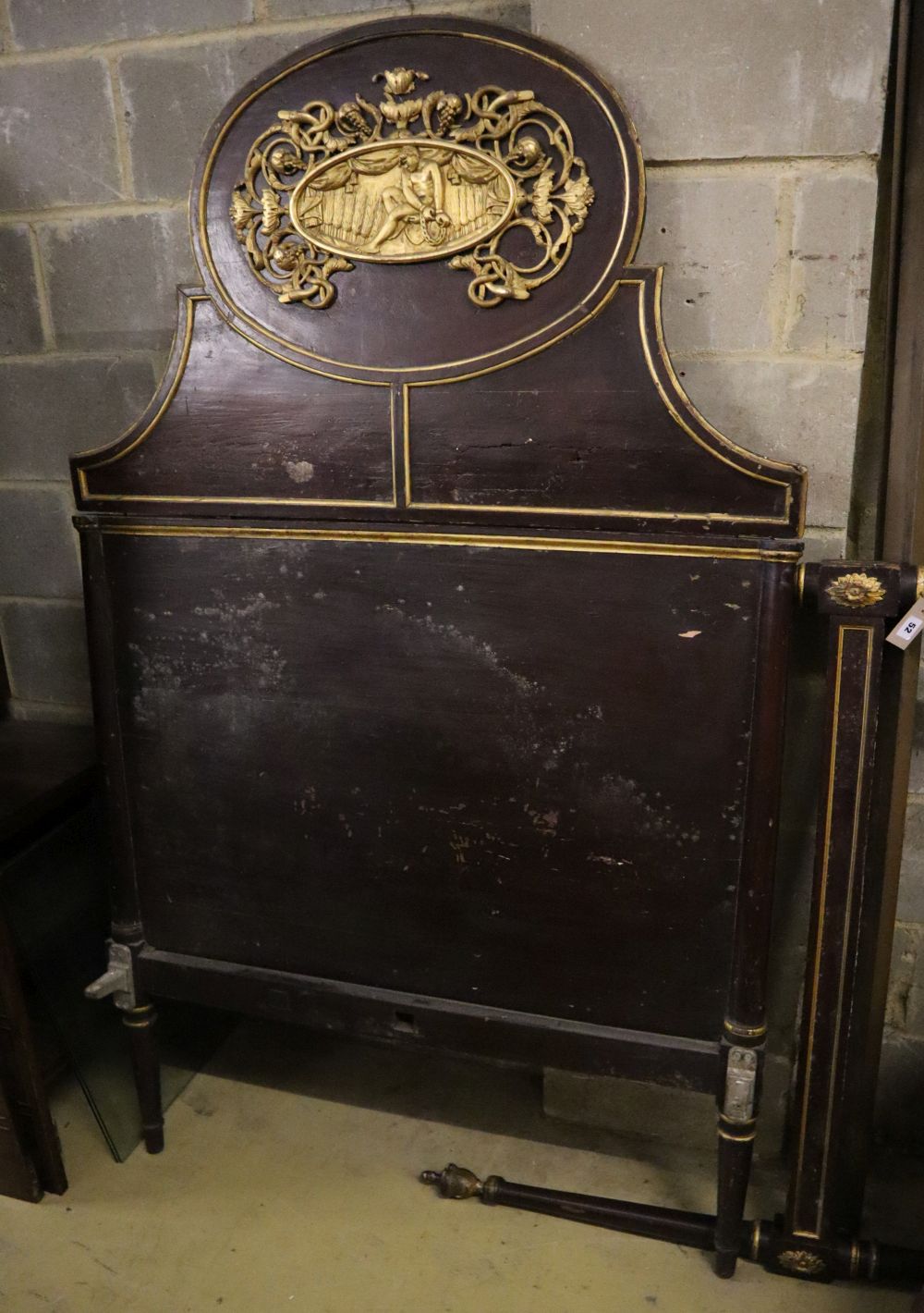 A Regency style gilt mahogany and pine bedstead, width 110cm